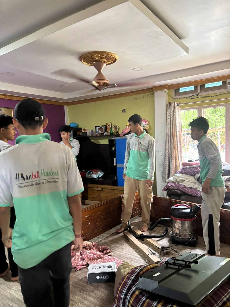 Staff carrying boxes